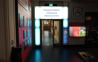 The door leading to the exit of the main gallery at Experience Barnsley Museum.